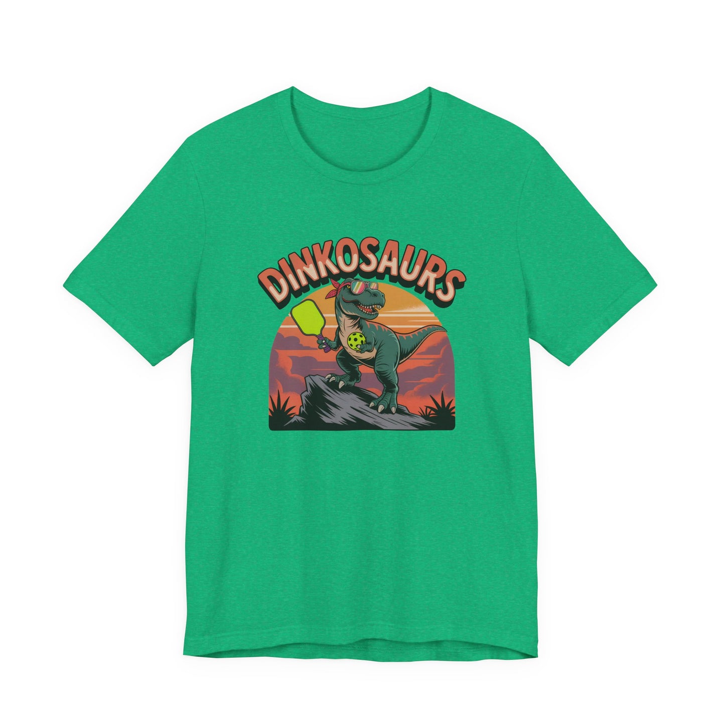 Dinkosaurs T‑Shirt — Retro Dino Holding Pickleball Paddle Graphic Tee